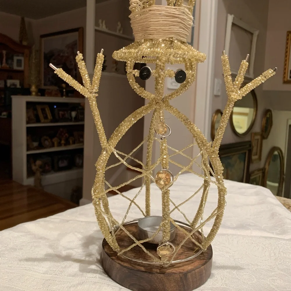 Snowman candle holder with wood base